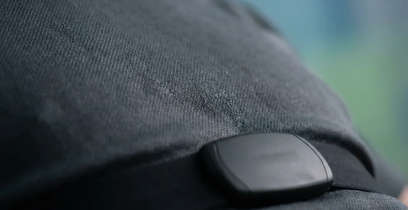 Close-up of athlete's chest with heart rate monitor showing zone data